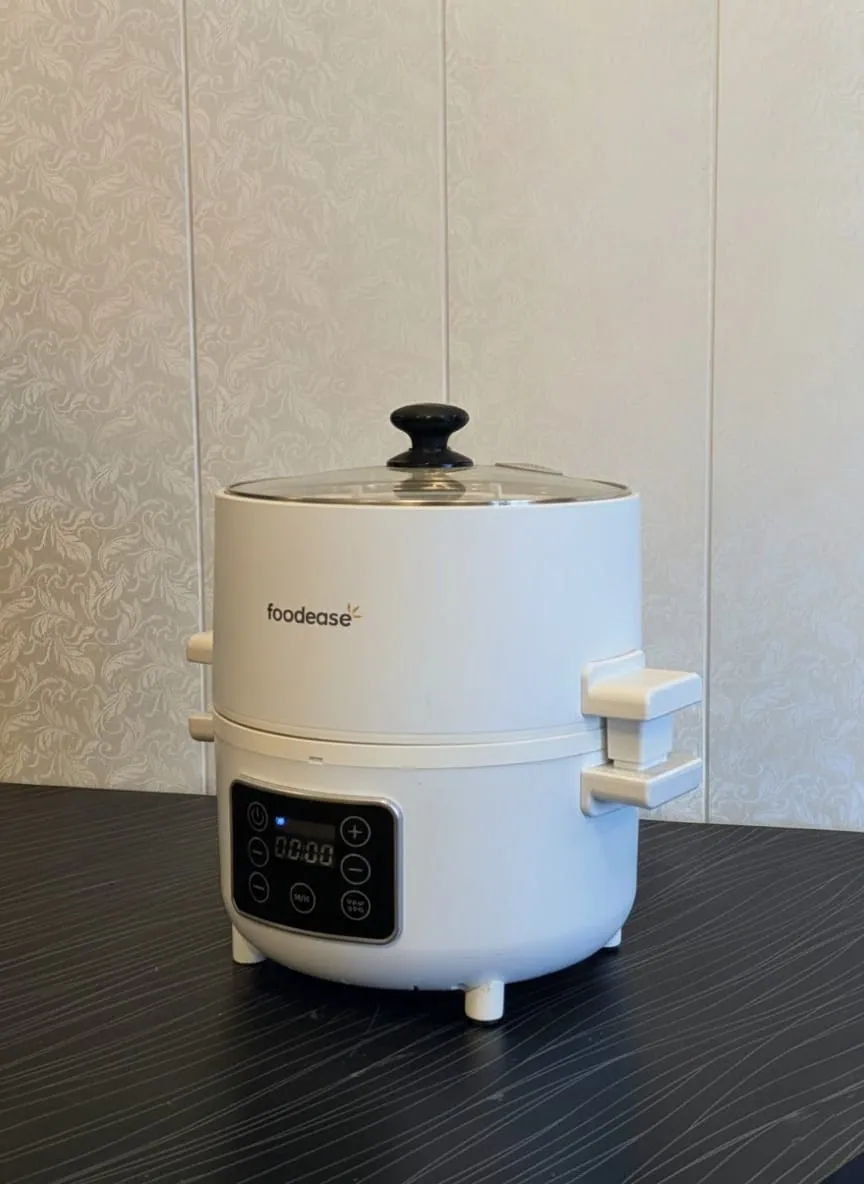 The Foodease automatic cooking device with its control display