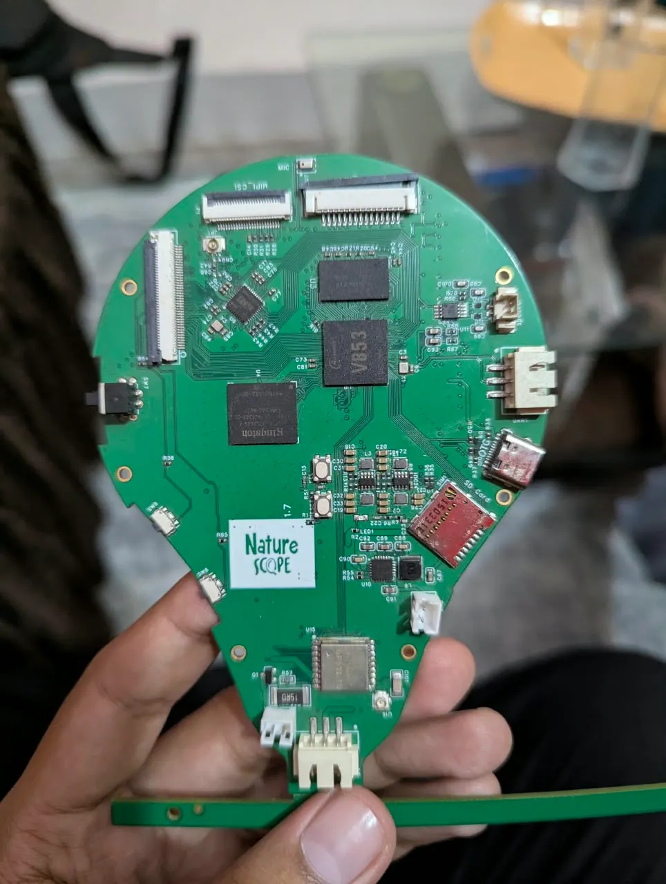 Custom round PCB with an Allwinner chip running edge-AI image classification